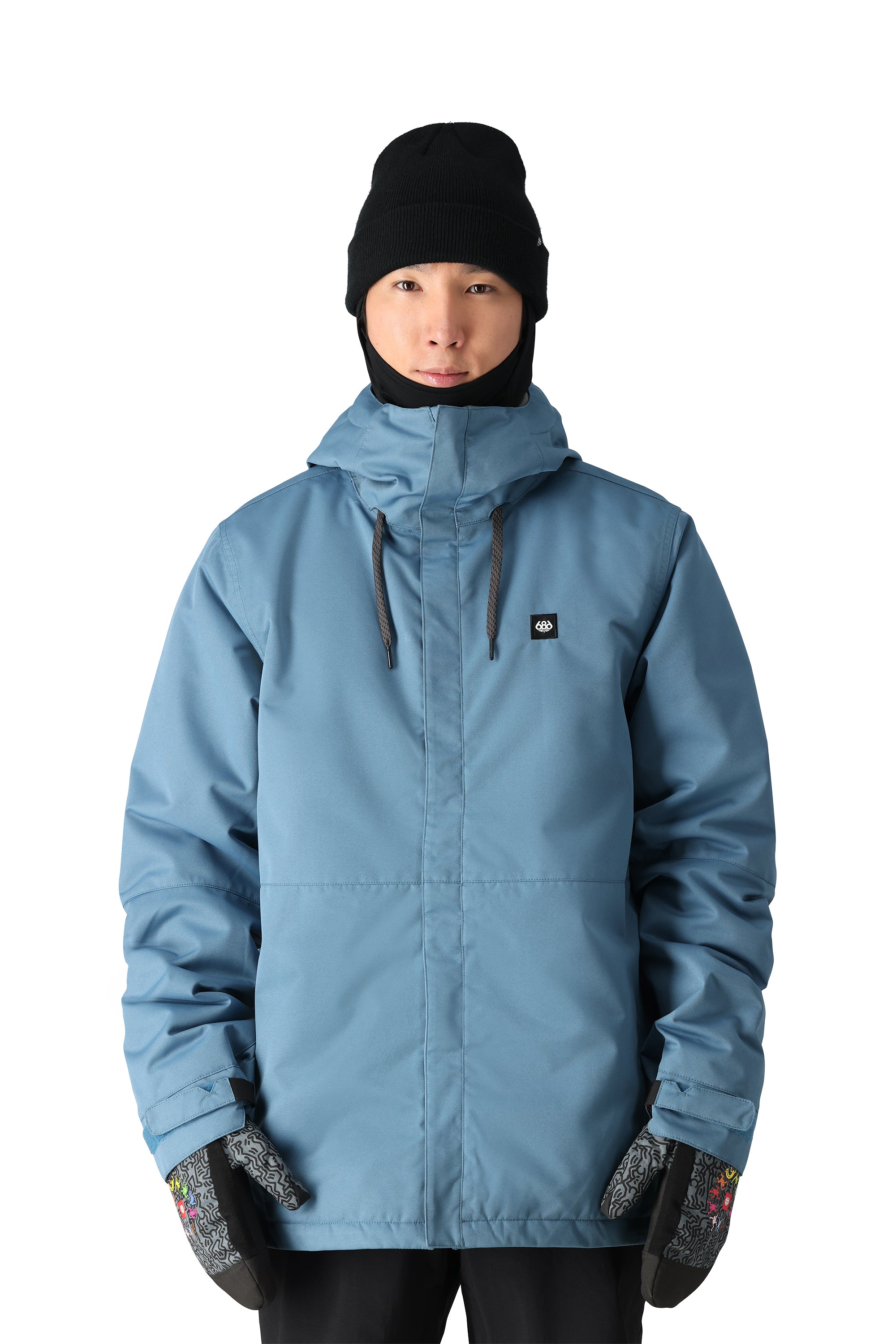 The 686 Foundation Insulated Jacket is shown in light blue with a black drawstring at the neck and an insulated hood.