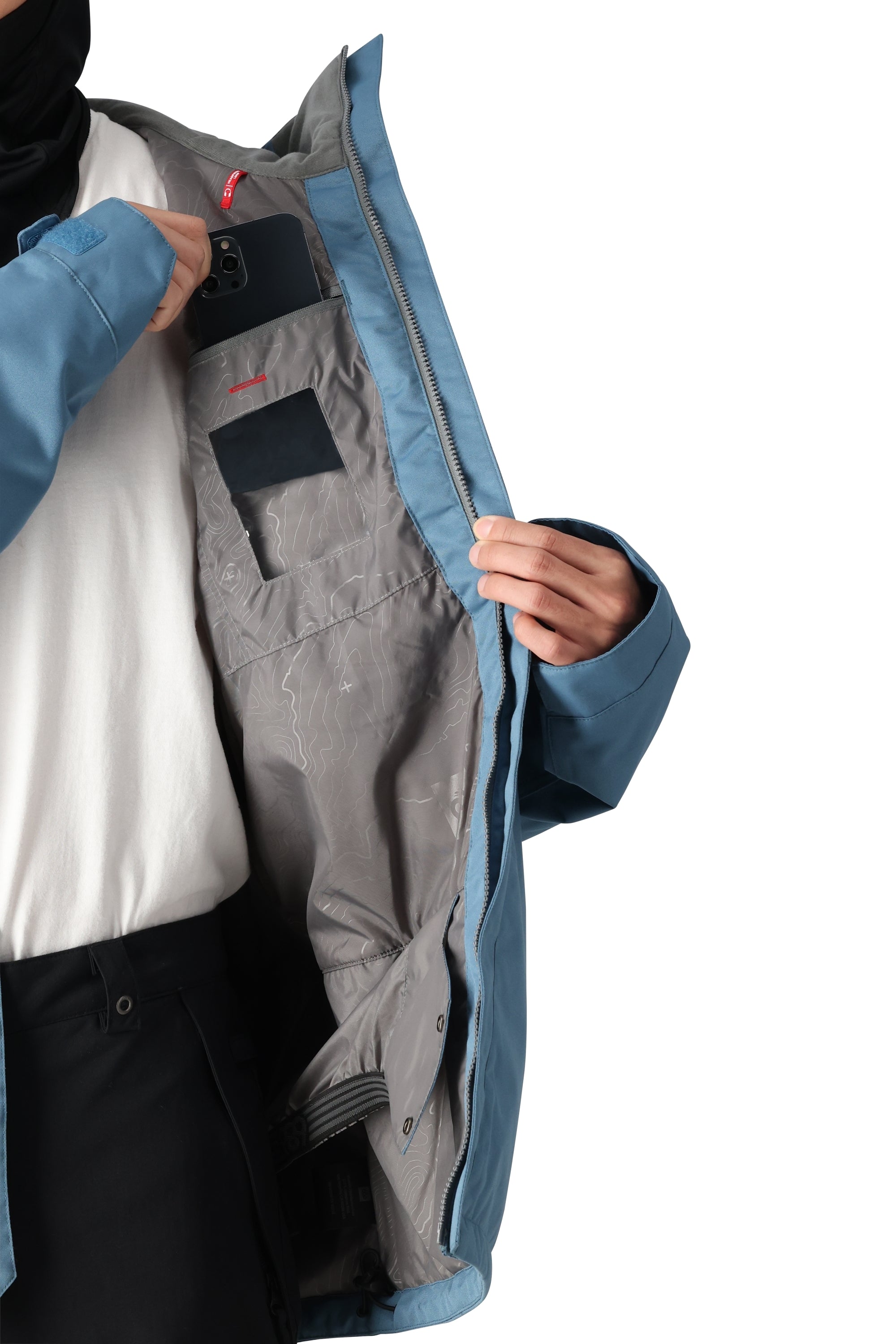 The 686 Foundation Insulated Jacket 2025 is dark blue with an insulated hood and black accents.