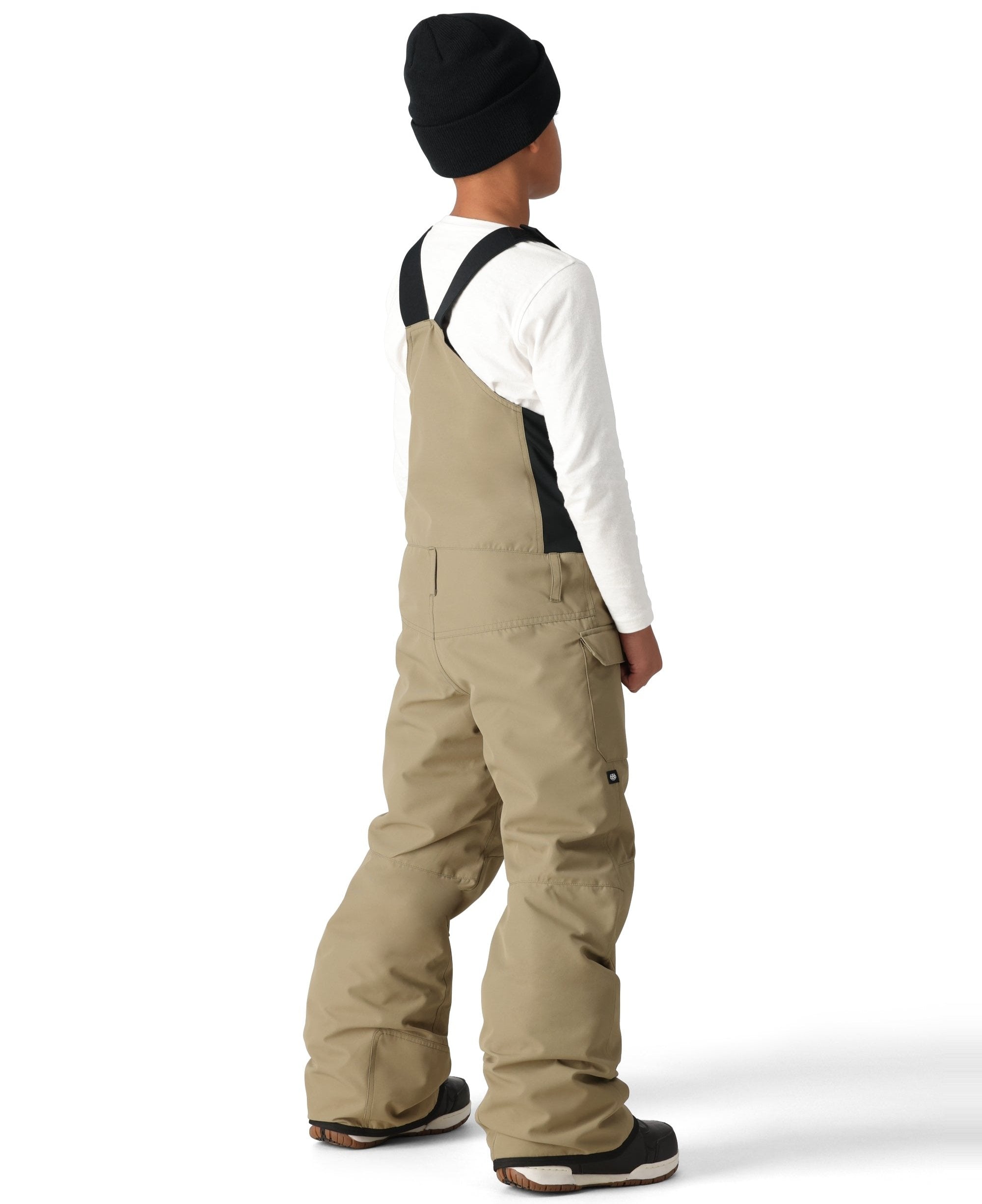 The 686 Boy's Frontier Insulated Bib features a solid khaki color with black accents and appears to be in a side view.