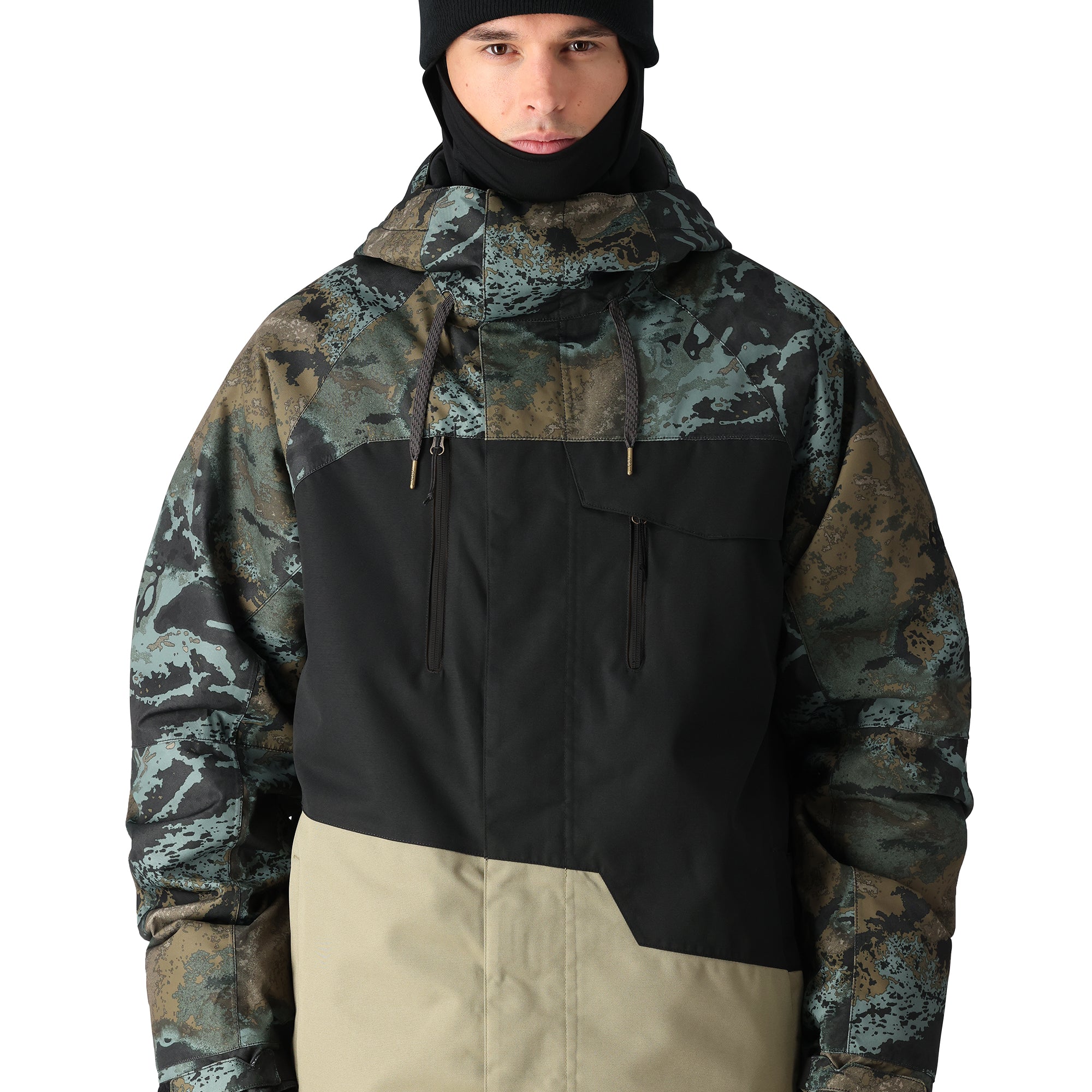 The 686 Geo Insulated Jacket in camouflage pattern has a black front panel and tan accents.