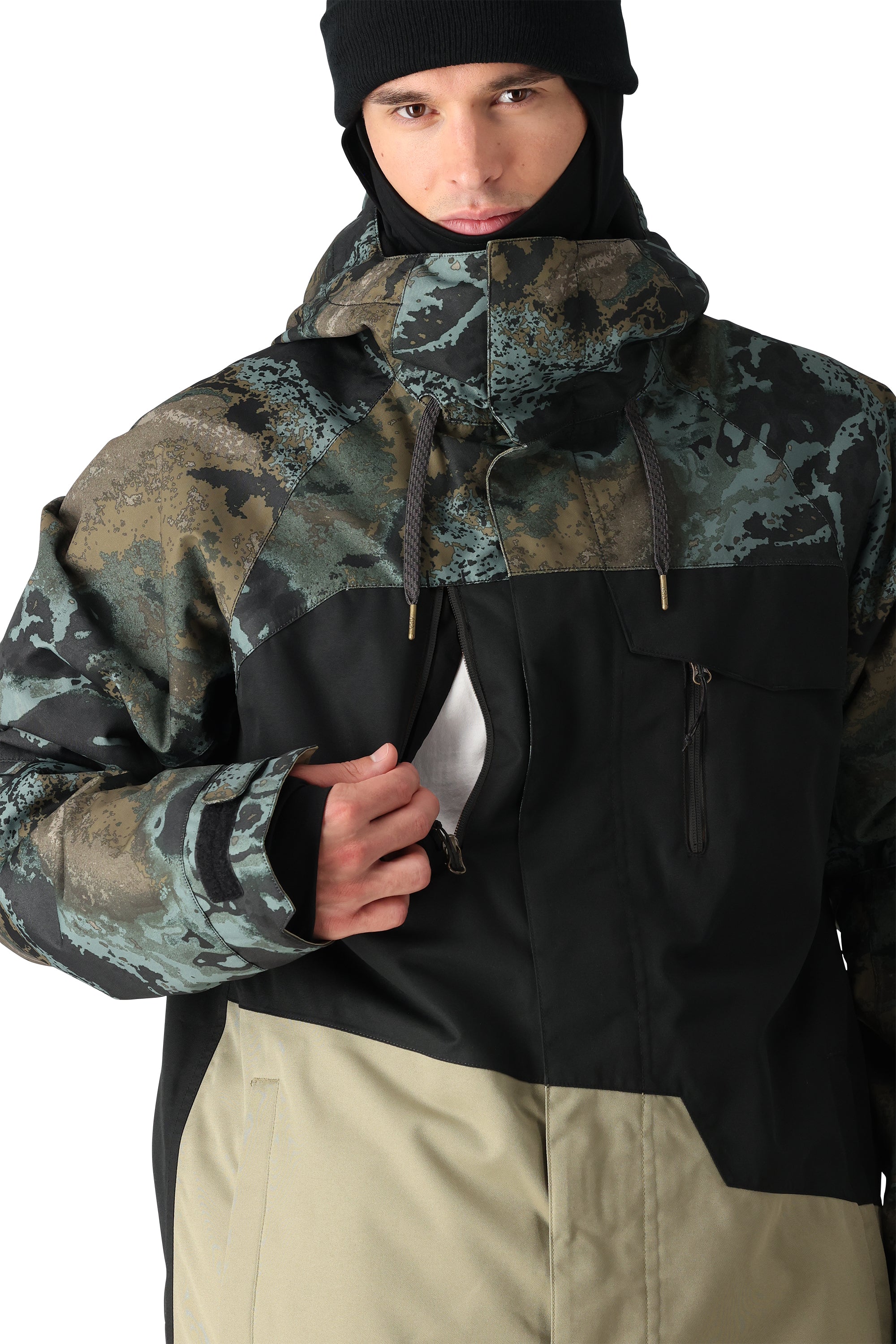 The 686 Geo Insulated Jacket 2025 is black with green and brown splotches, showcasing an insulated hood and a zippered front.