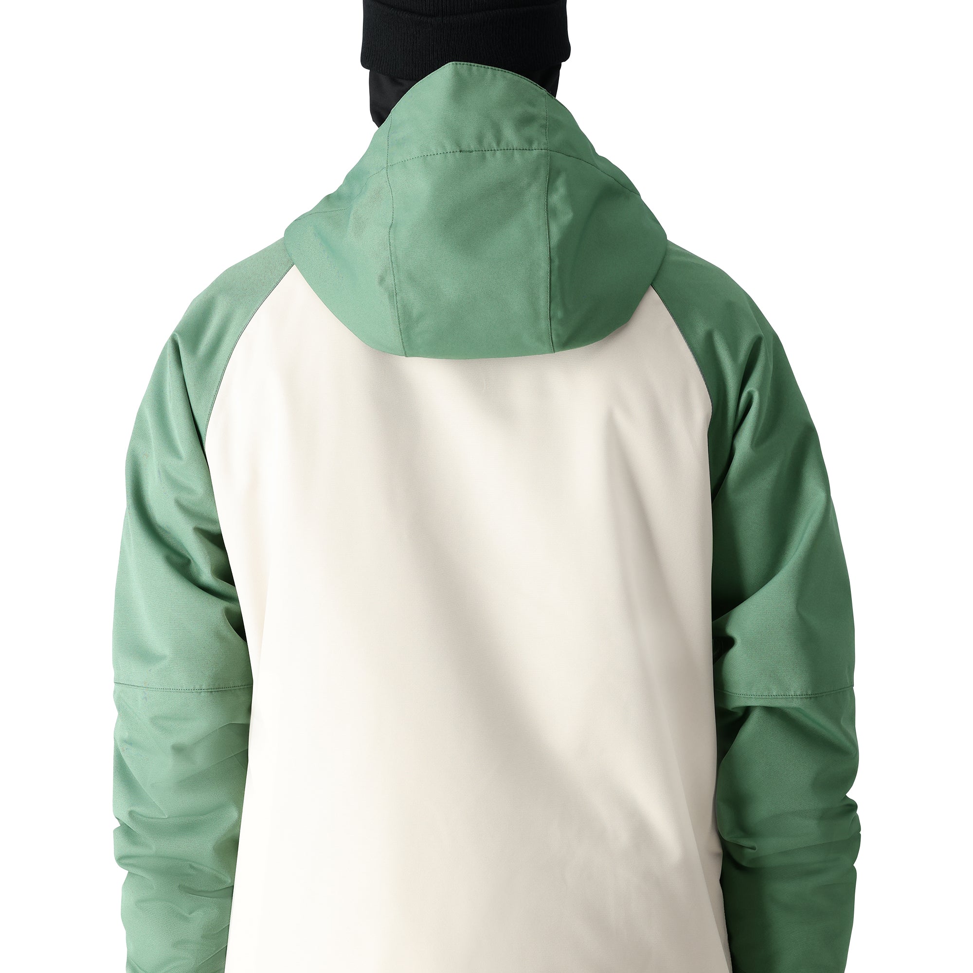 The 686 brand's Geo Insulated Jacket 2025, visible from the back, has a cream-colored panel on both sides and green sleeves.