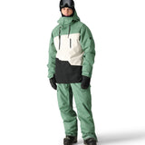 The 686 Geo Insulated Jacket 2025 is shown in this image from the front view, with a predominantly mint green color scheme and a white stripe across the chest.