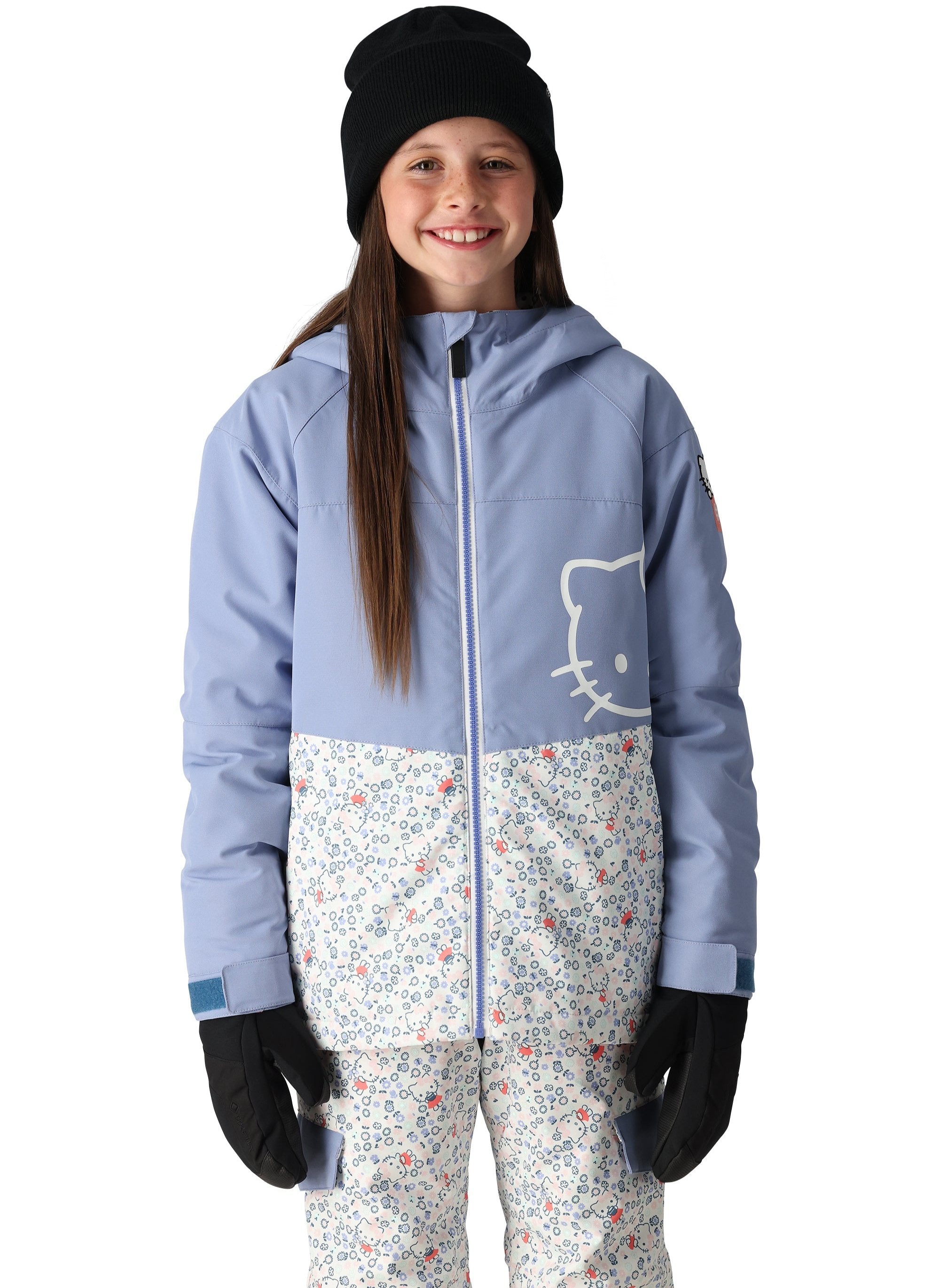 The 686 Girl's Athena Insulated Jacket 2025 is primarily light blue with a white graphic on the front and has an insulated hood.