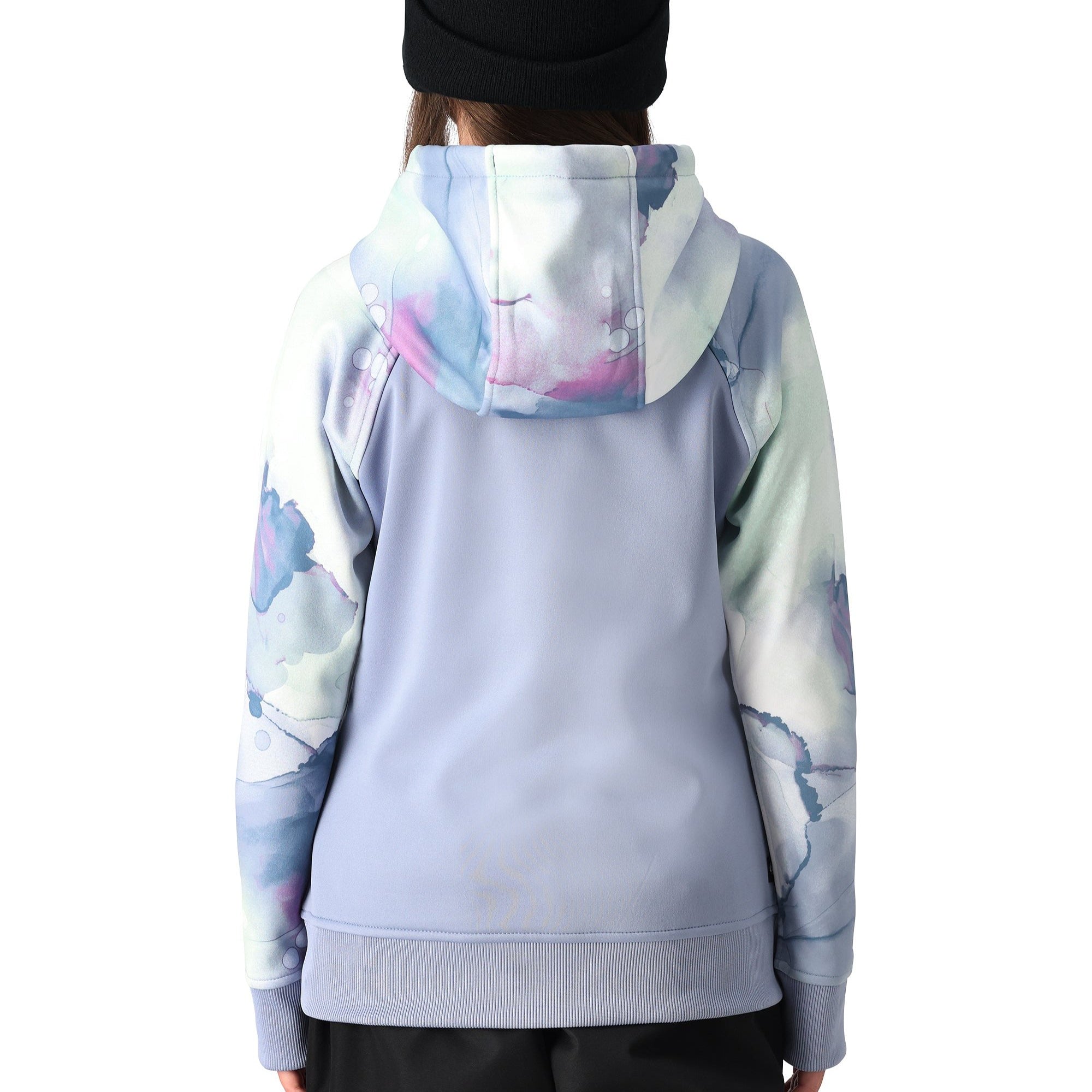 A light blue 686 pullover hoodie with a hood and drawstrings features a design with pink, green, and white abstract shapes.
