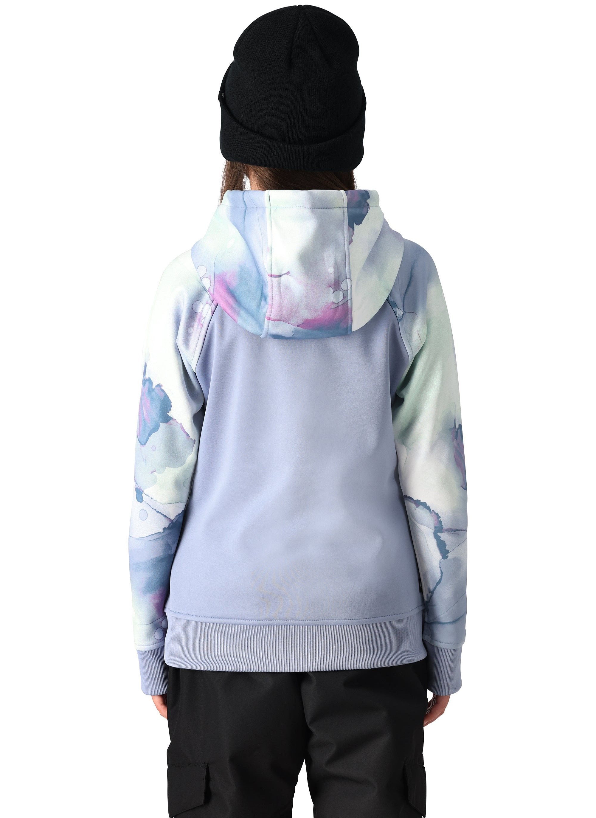 A light blue 686 pullover hoodie with a hood and drawstrings features a design with pink, green, and white abstract shapes.