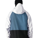 The 686 Gore-Tex Core Shell Jacket 2025 features a predominantly white design with blue and black accents on the back.