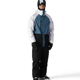 The 686 Gore-Tex Core Shell Jacket 2025 is predominantly white with blue and black accents.