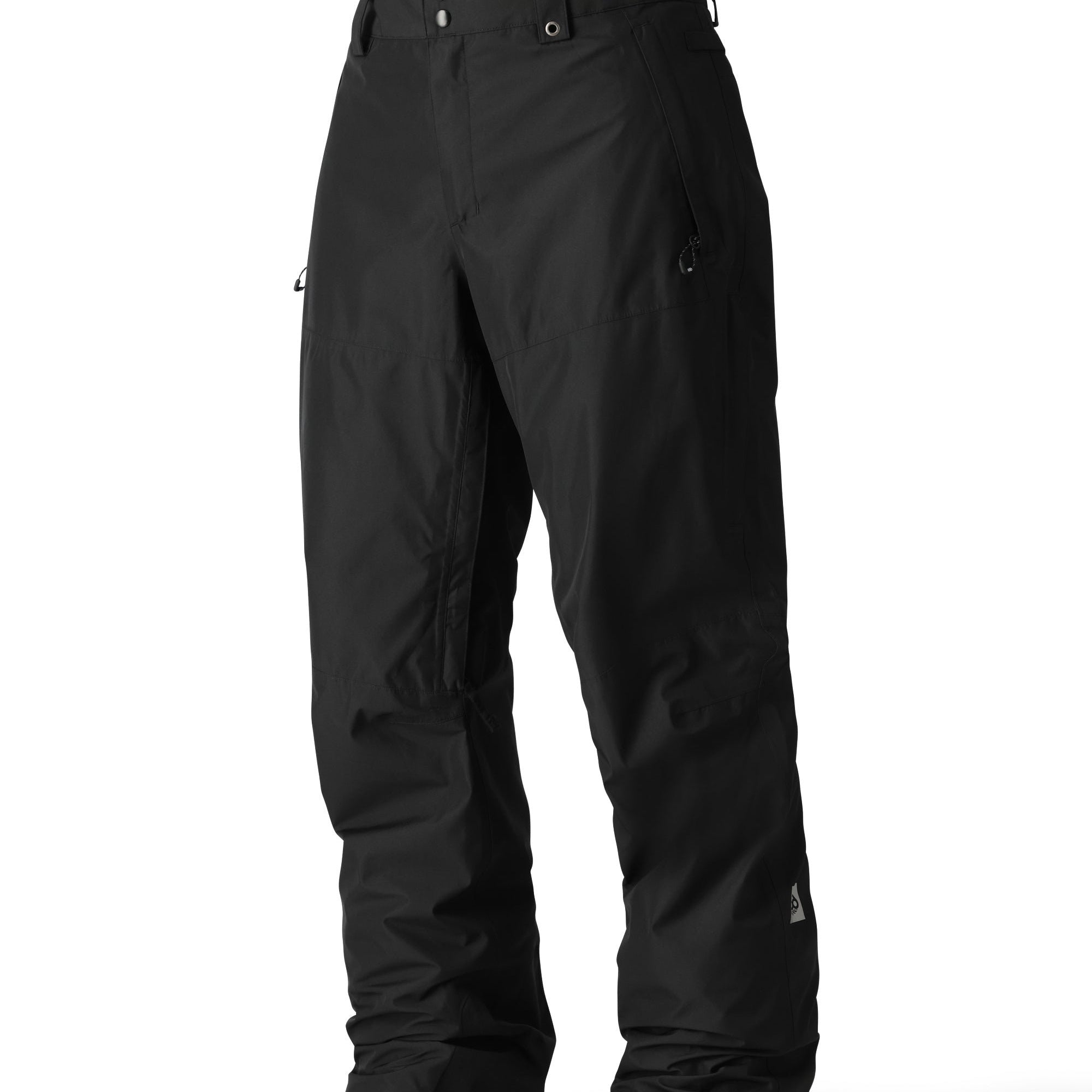 The 686 Men's GORE-TEX Core Shell Pant 2025 is primarily black with silver accents and a zippered pocket on the right thigh.