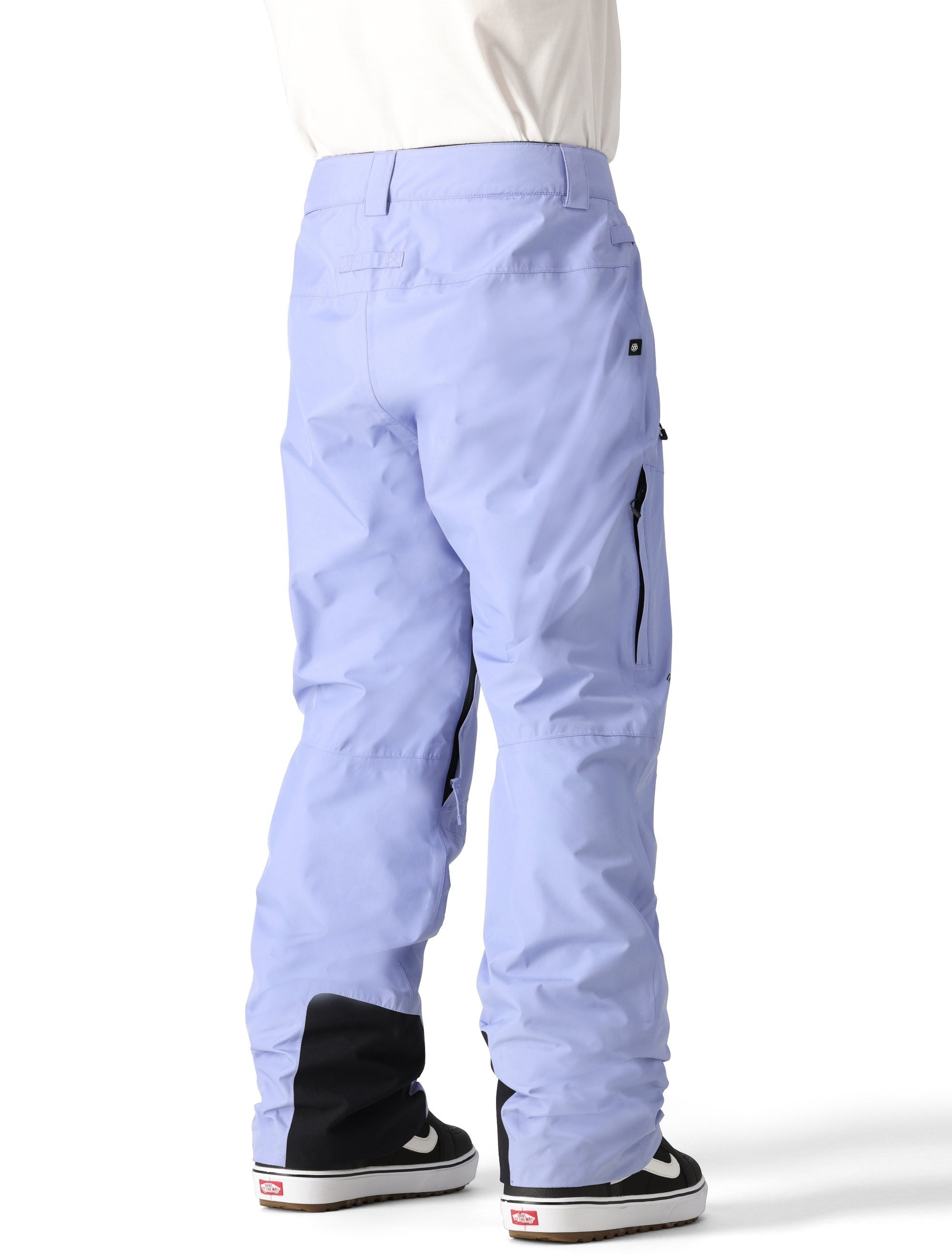 The 686 Men's GORE-TEX Core Shell Pant 2025 in light blue features a zippered leg pocket on the right side.