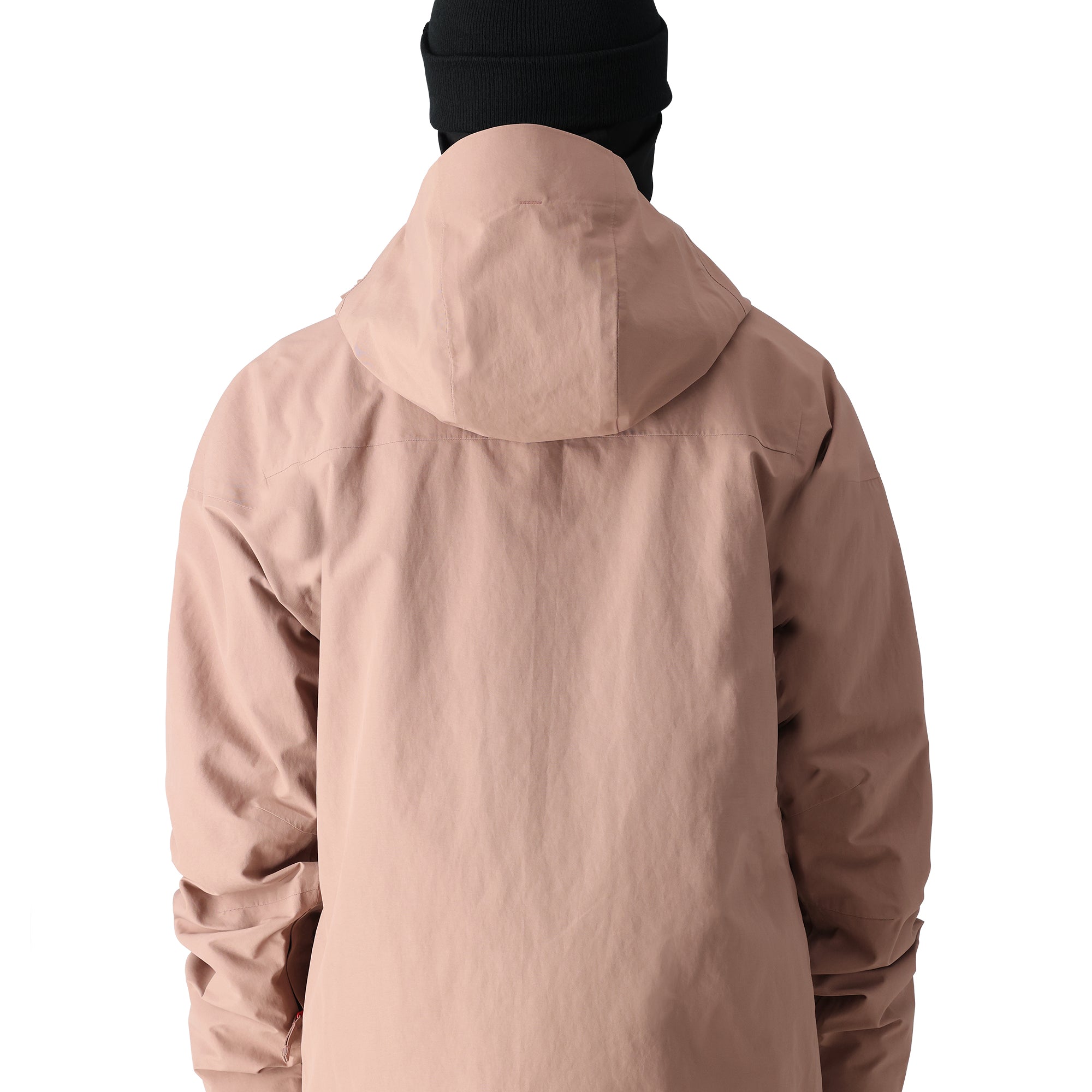 The 686 Gore-Tex GT Shell Jacket in tan has a hood and a prominent zippered front.