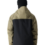 The 686 Gore-Tex GT Shell Jacket 2025 in khaki and black has an insulated hood.