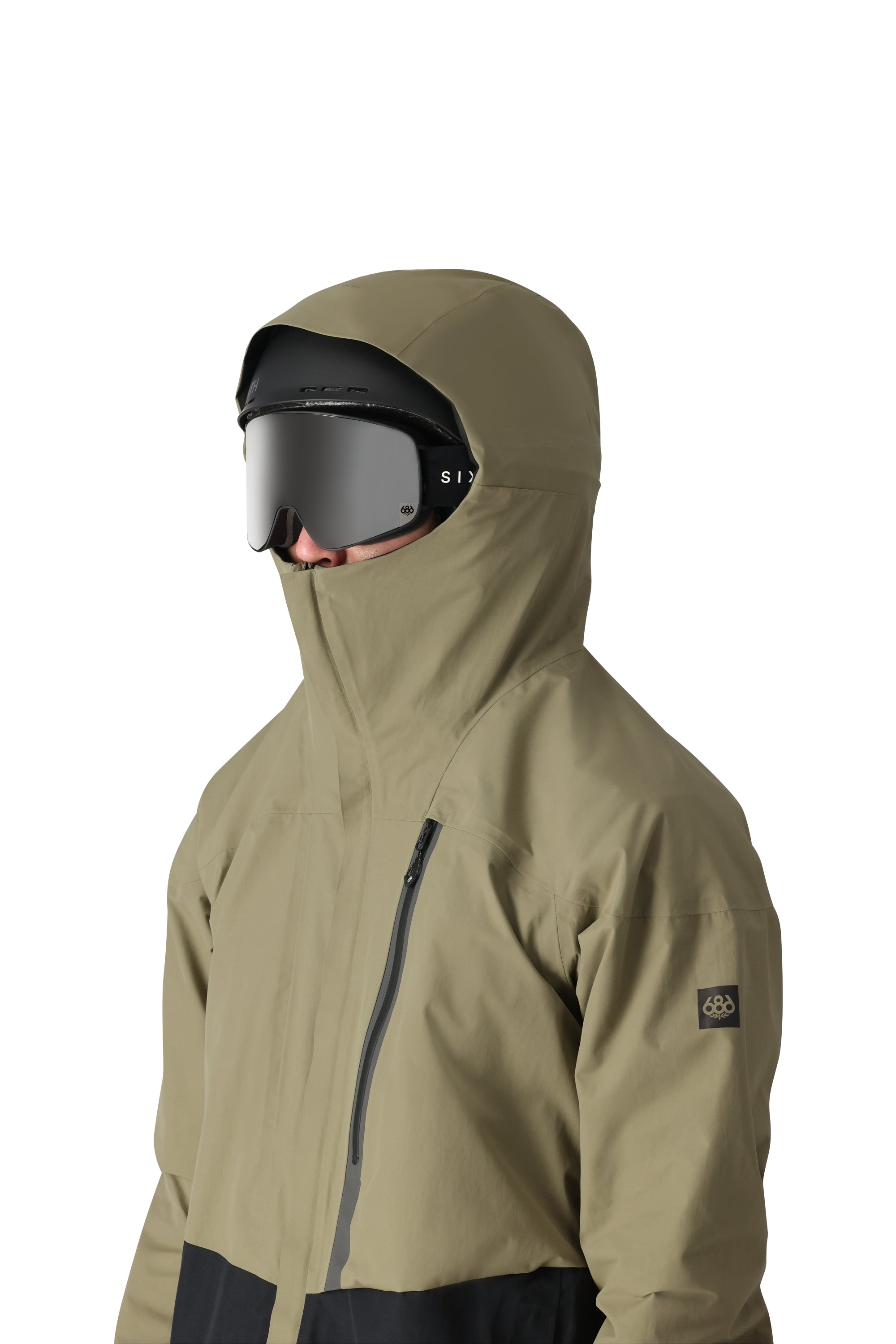 The 686 Gore-Tex GT shell jacket in khaki and black has an insulated hood, zippered chest pocket, and front zipper.