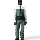 The 686 Men's GORE-TEX GT Pant 2025 is primarily white with green accents and black trim.