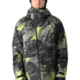 The 686 Gore-Tex Hydra Down Thermagraph jacket has a black base color with neon green splatter accents.