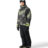 The 686 Gore-Tex Hydra Down Thermagraph jacket features a black and green camouflage pattern with a high collar and zippered front.