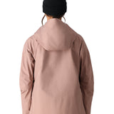 The 686 Women's GORE-TEX Skyline Shell Jacket 2025 is primarily pink with a black BOA dial on the right sleeve and an insulated hood.