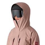 The 686 Women's GORE-TEX Skyline Shell Jacket 2025 is primarily a dusty rose color with rose-colored zipper pulls and a black BOA dial on the left side of the front, as seen from the chest down.