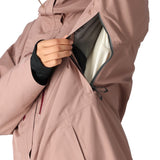 The 686 Women's GORE-TEX Skyline Shell Jacket 2025 is shown in a dusty rose color with a black zipper and a white fleece lining.