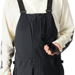 The 686 men's GORE-TEX stretch dispatch bib appears to be black with an insulated hood.