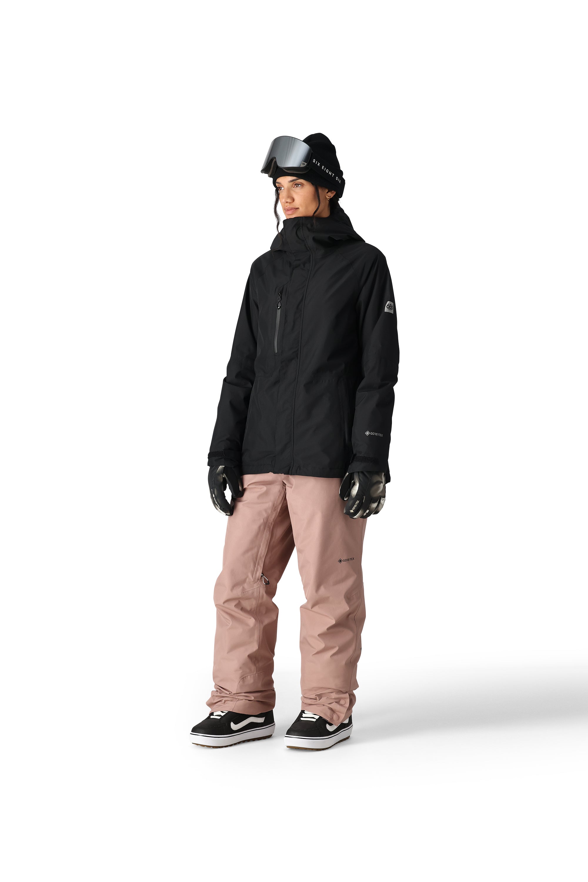 The 686 Women's GORE-TEX Willow Insulated Jacket 2025 is black with a high collar and zippered pockets on both sides.