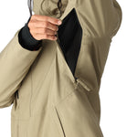 The 686 Women's GORE-TEX Willow Insulated Jacket 2025 is primarily tan with black accents and a black zipper on its front.