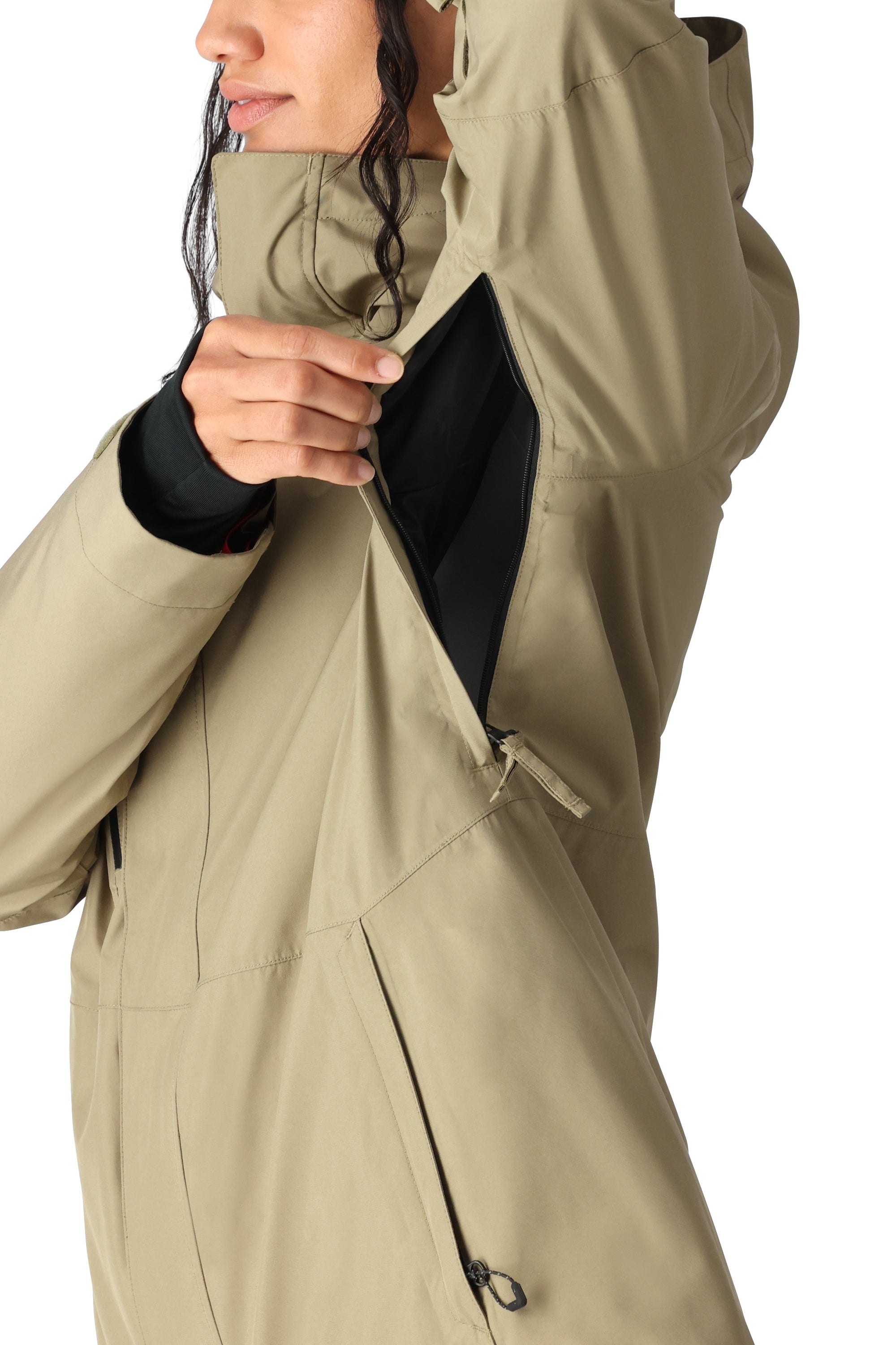 The 686 Women's GORE-TEX Willow Insulated Jacket 2025 is primarily tan with black accents and a black zipper on its front.