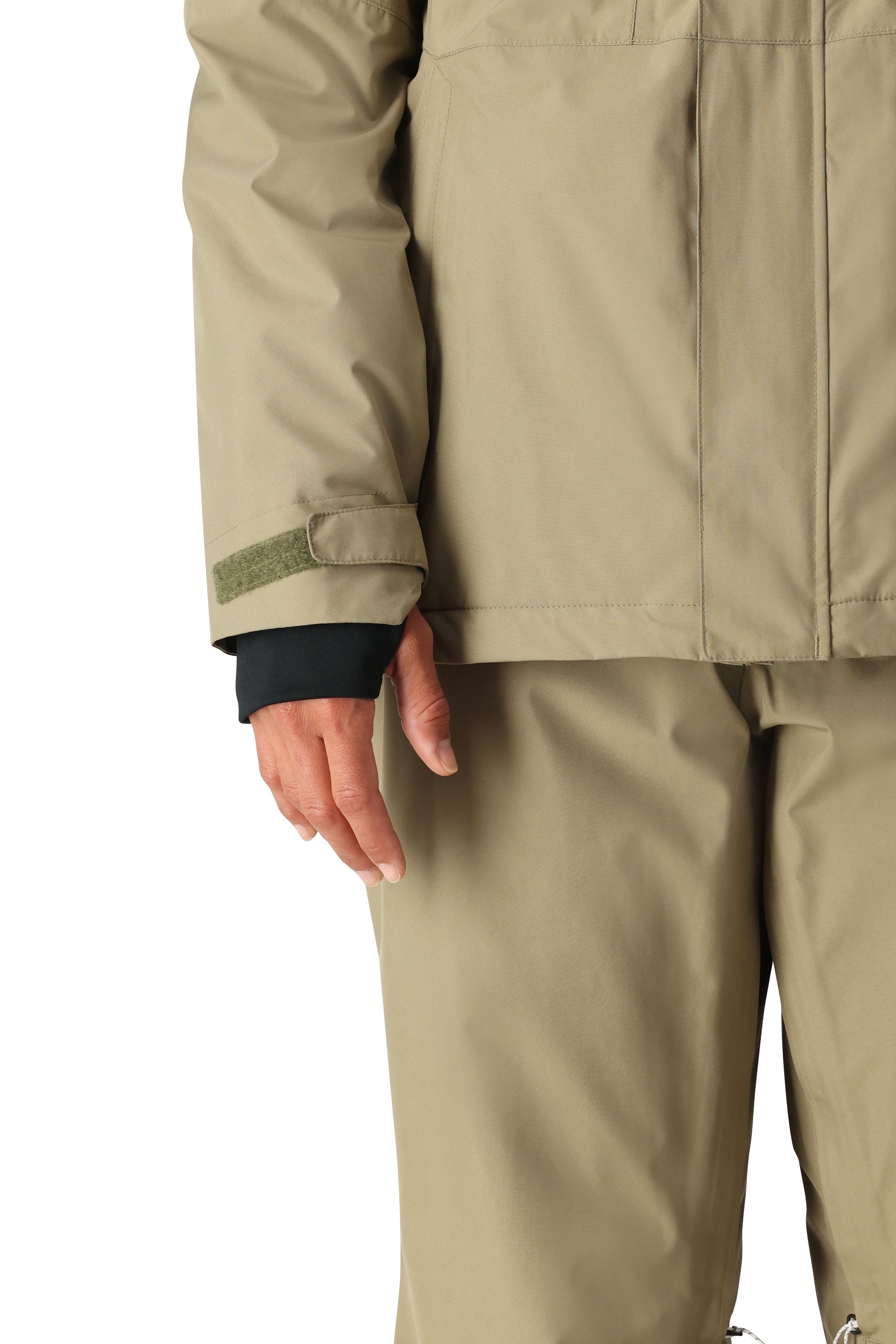 The 686 Women's GORE-TEX Willow Insulated Jacket 2025 is shown in khaki with a green stripe on the sleeve cuff.