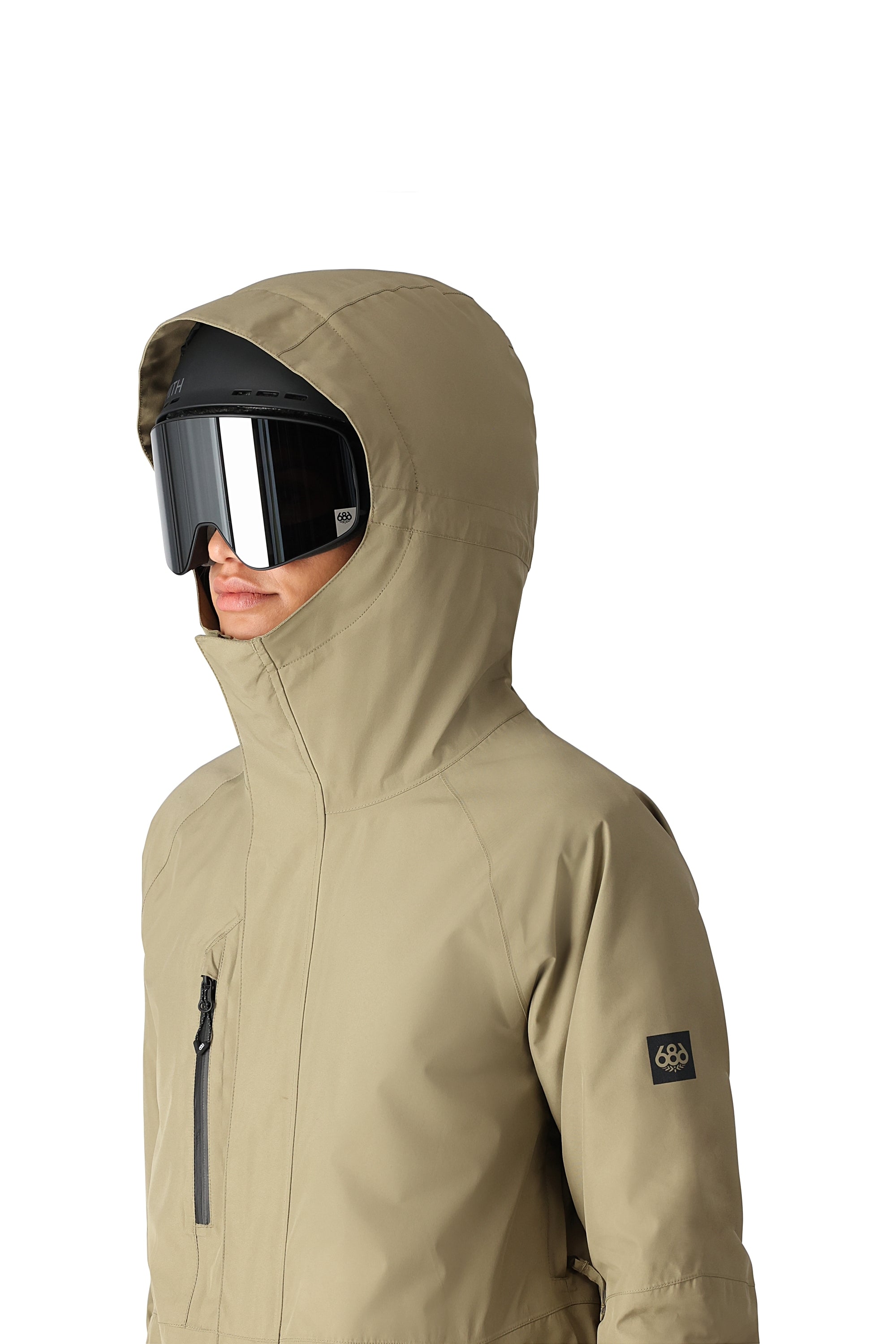 The 686 Women's GORE-TEX Willow Insulated Jacket 2025 is primarily khaki with a black BOA dial and front zip on the side view.