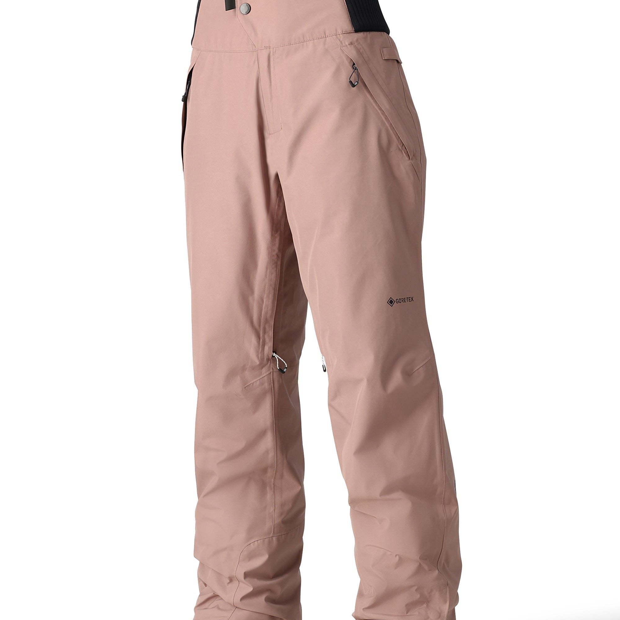 The 686 brand's GORE-TEX Willow Insulated Pant 2025 in a light pink color is shown from the front with a black waistband and two zippered pockets.