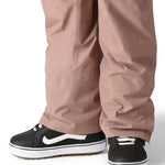 The 686 brand offers these rose-colored, insulated pants with a zippered pocket on the left leg and an adjustable waistband.