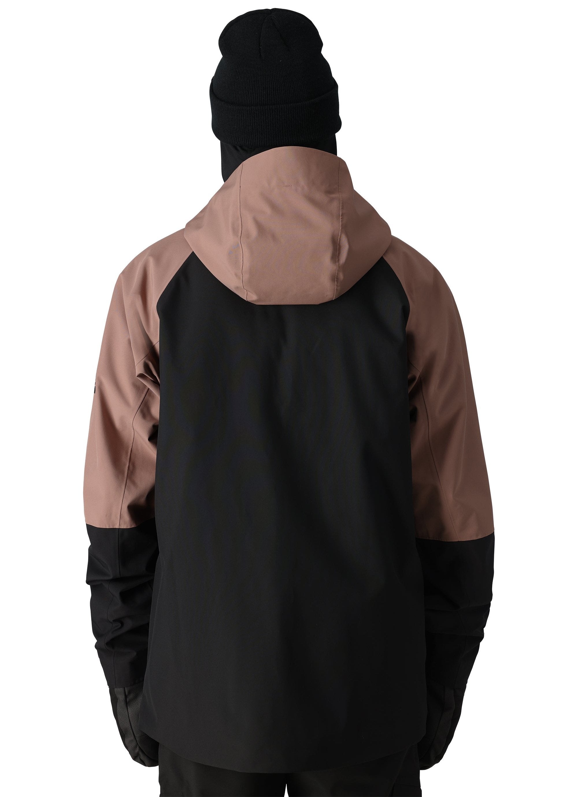 The 686 Hydra Thermagraph jacket in black and brown has an insulated hood with a zippered front closure.