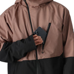 The 686 Hydra Thermagraph Jacket in brown and black has an insulated hood with a drawstring.