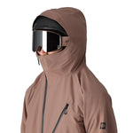 The 686 Hydra Thermagraph jacket in brown has an insulated hood and a front zipper.