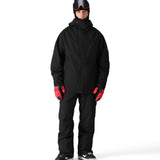 The 686 Hydra Thermagraph Jacket in black has an insulated hood and a BOA dial on the left wrist.