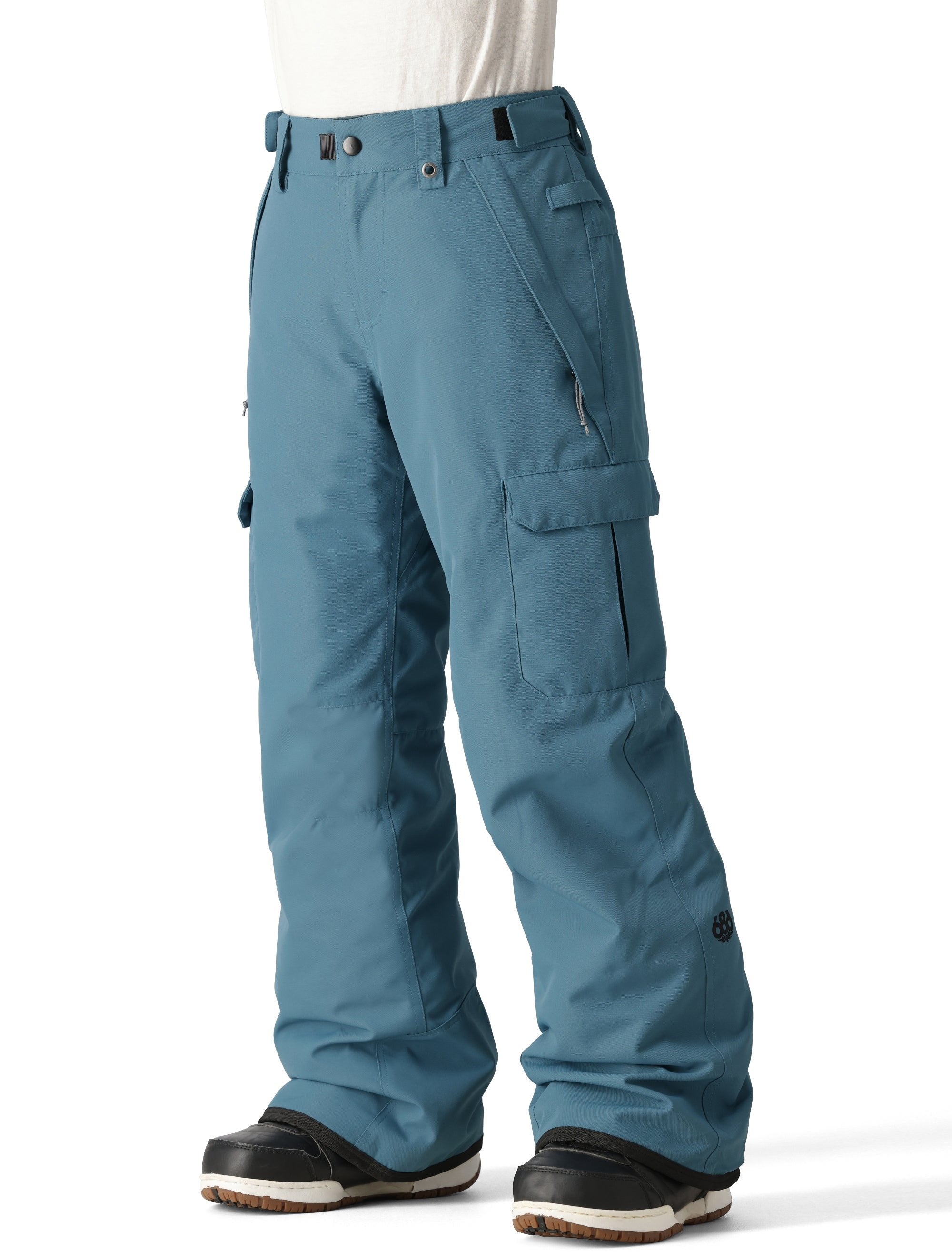 The 686 Boy's Infinity Cargo Insulated Pant 2025 is shown from the front view, showcasing a pair of blue snow pants with cargo pockets on each thigh.