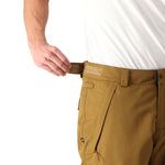 The 686 Men's Infinity Insulated Cargo Pant 2025 is showcased from the front in a brown color with a BOA dial on the waistband.