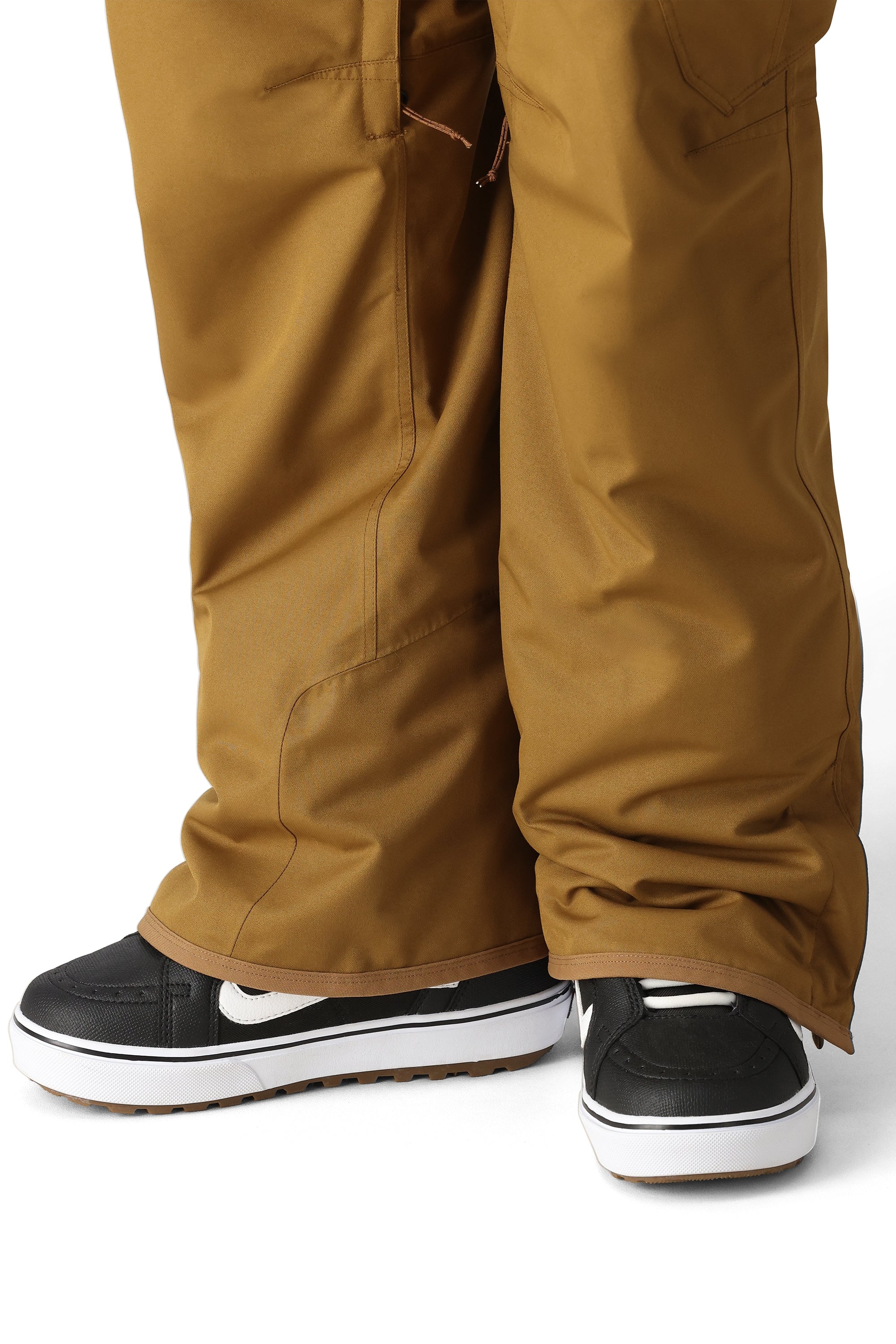 The 686 Men's Infinity Insulated Cargo Pant 2025 is showcased in a front view, with a brown color and visible cargo pockets.