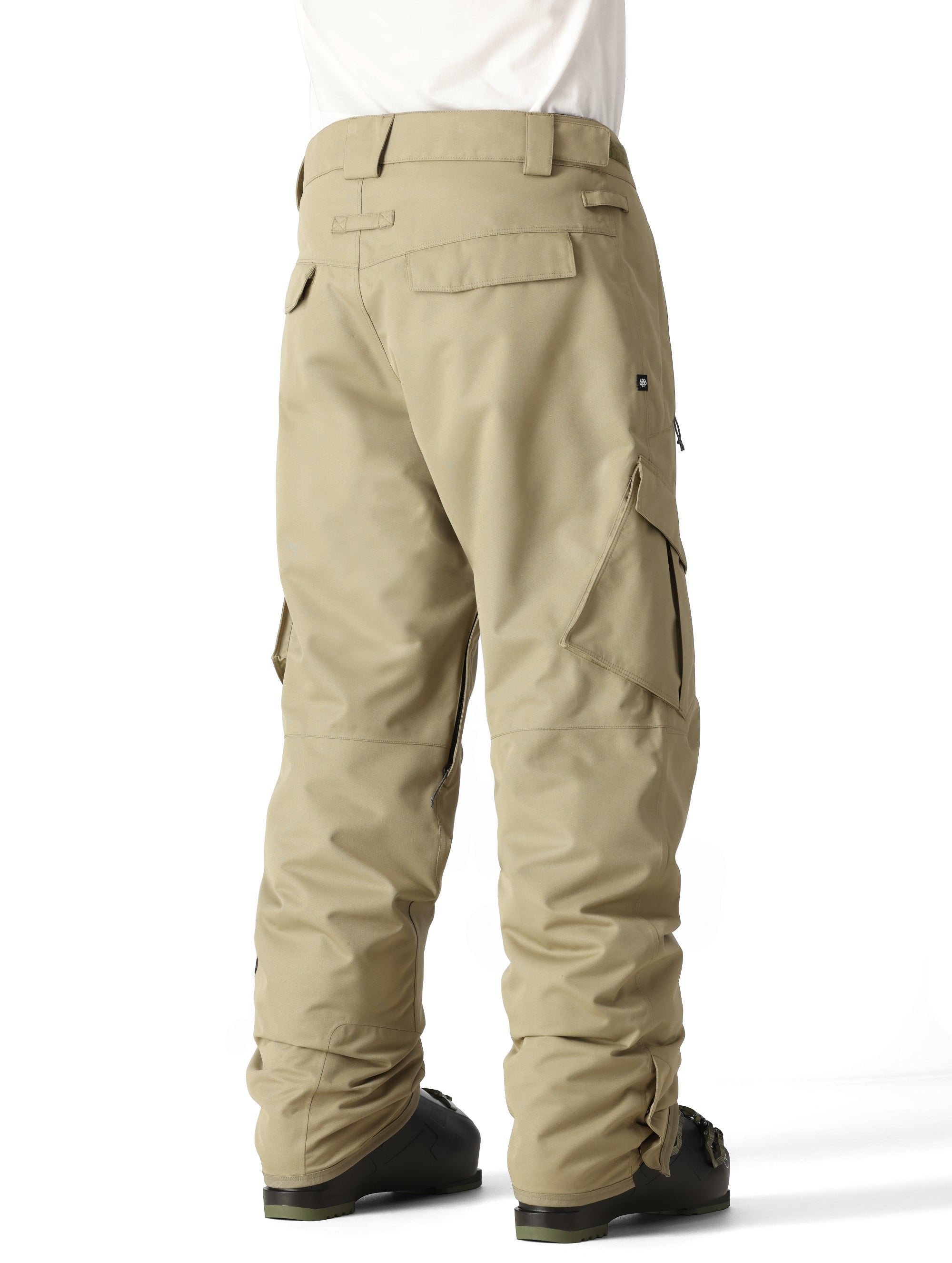 The 686 Men's Infinity Insulated Cargo Pant 2025 is shown in a khaki color with multiple cargo pockets on each leg.