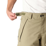 The 686 Infinity Insulated Cargo Pant has an olive green color and side cargo pockets with snap closures.