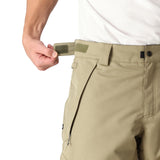 The 686 Infinity Insulated Cargo Pant has an olive green color and side cargo pockets with snap closures.