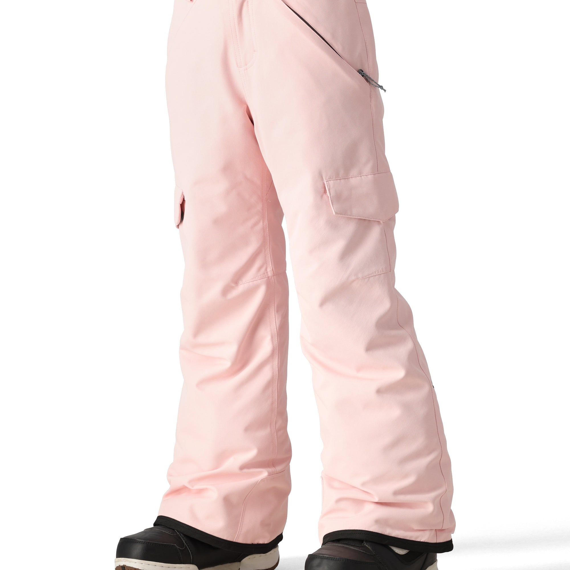 The 686 Girl's Lola Insulated Pant 2025 is light pink with a zippered pocket on the right thigh and an adjustable strap at the waist.