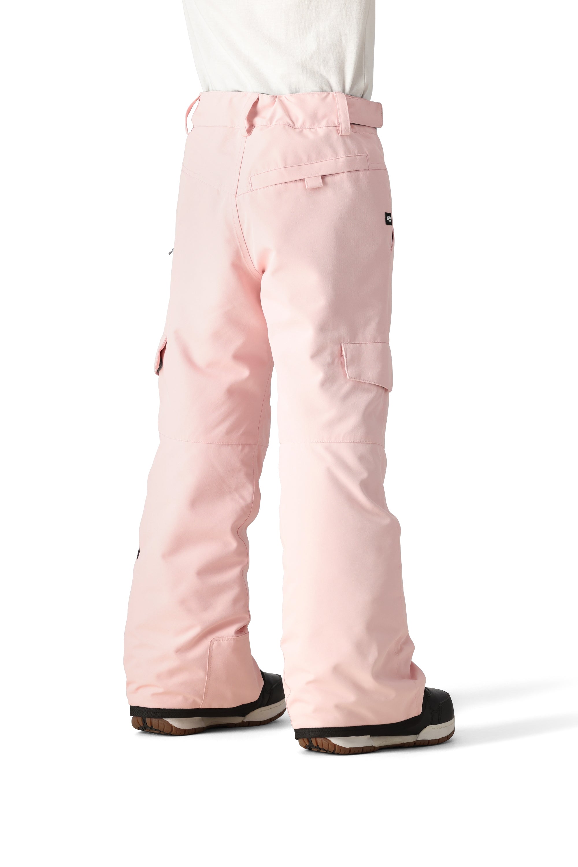 The 686 Girl's Lola Insulated Pant 2025 is light pink with a belt and pockets, seen from the front.