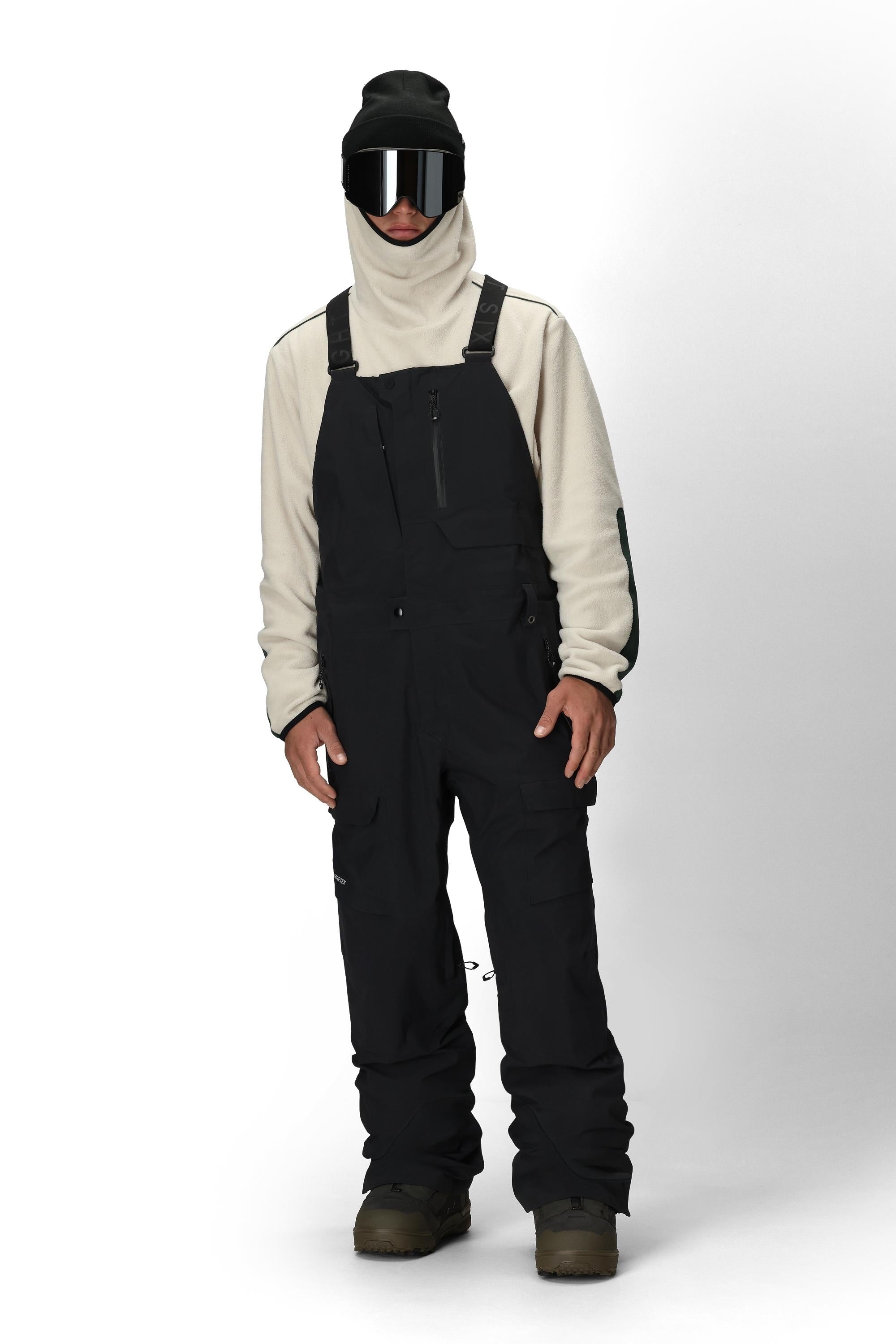 Men's black bib shell overalls with chest pocket and side hand pockets