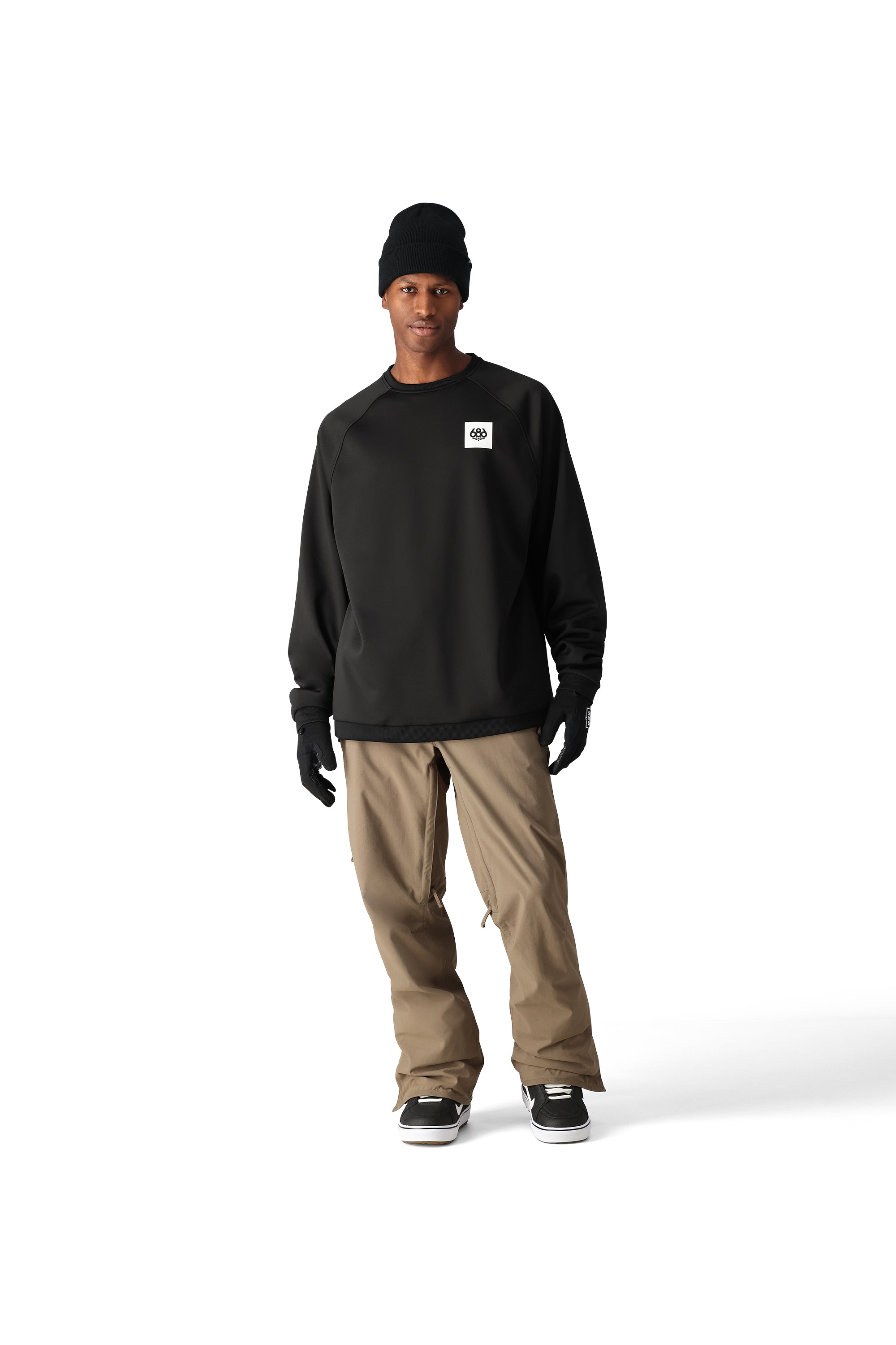 The 686 Men's Bonded Fleece Crew appears to be black with a white logo on the left chest.