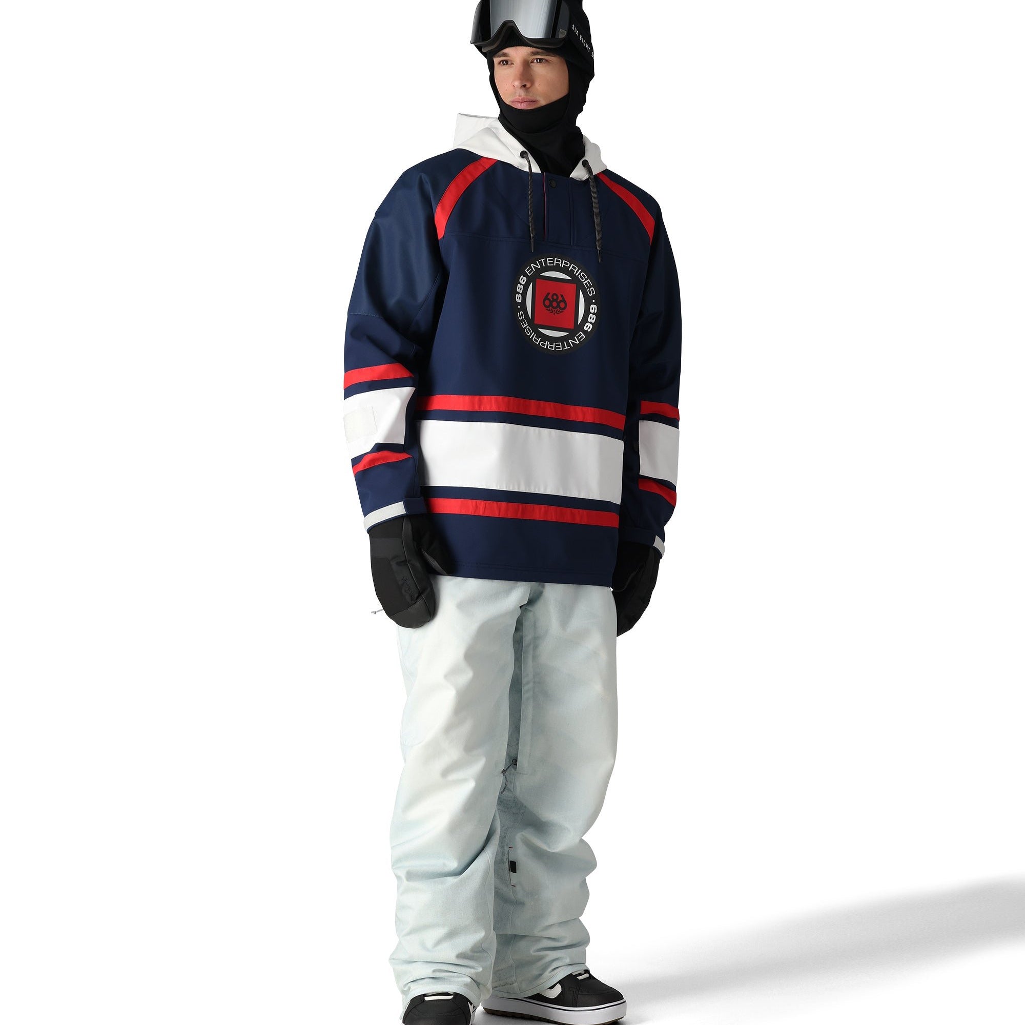 The 686 Deconstructed Denim Insulated Pant 2025 is shown from the front in light blue with red stripes and a white stripe across the waistband.