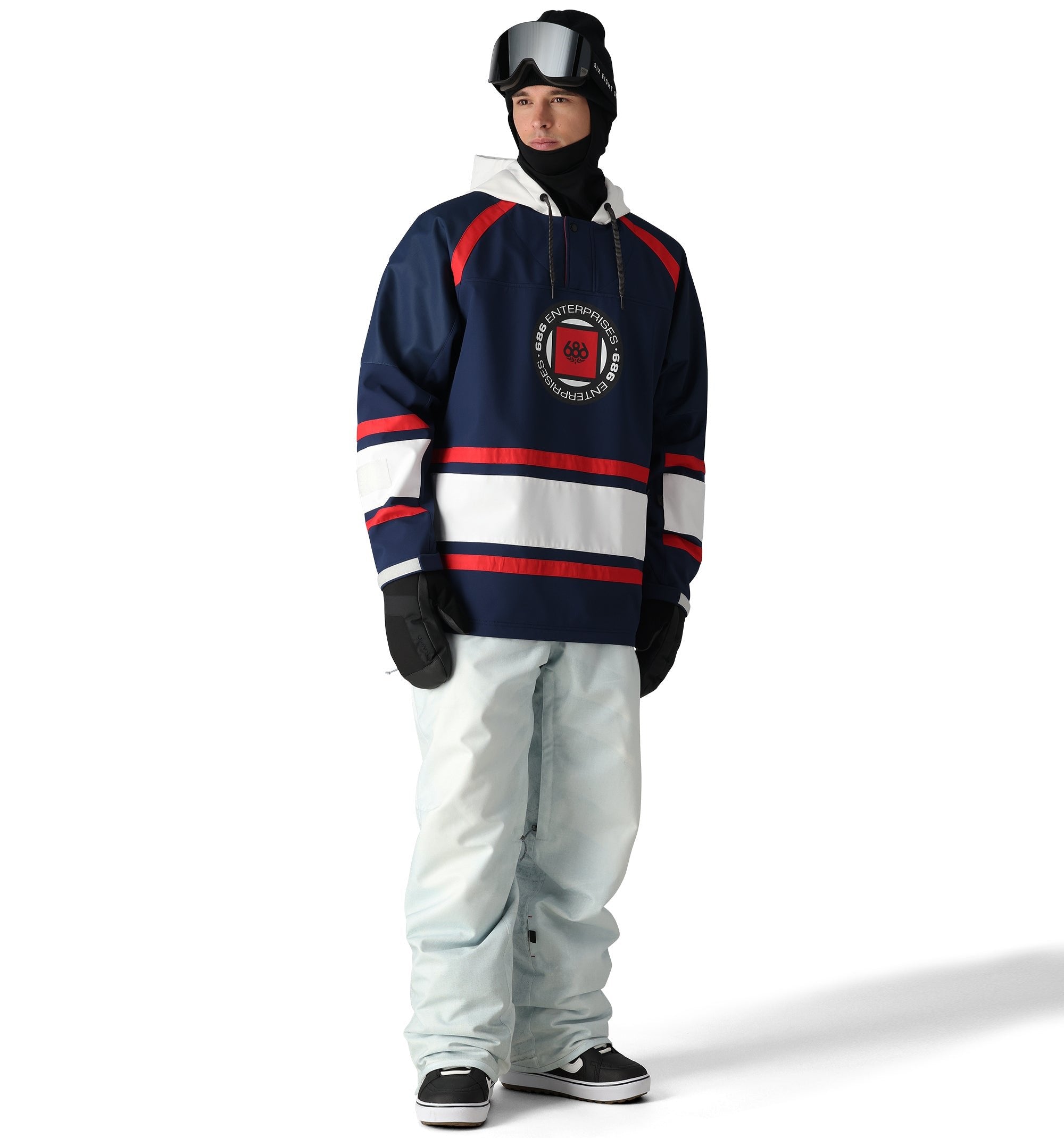 The 686 Deconstructed Denim Insulated Pant 2025 is shown from the front in light blue with red stripes and a white stripe across the waistband.