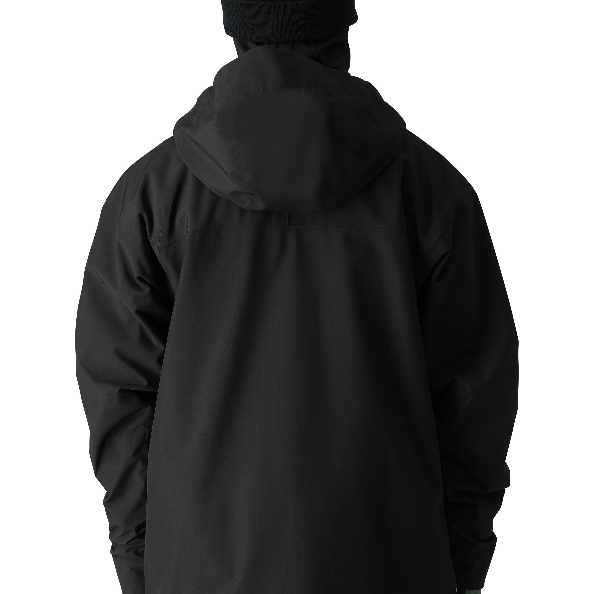 The 686 Gateway Shell Jacket 2025 in black has a large hood and zippered pockets on both sides.