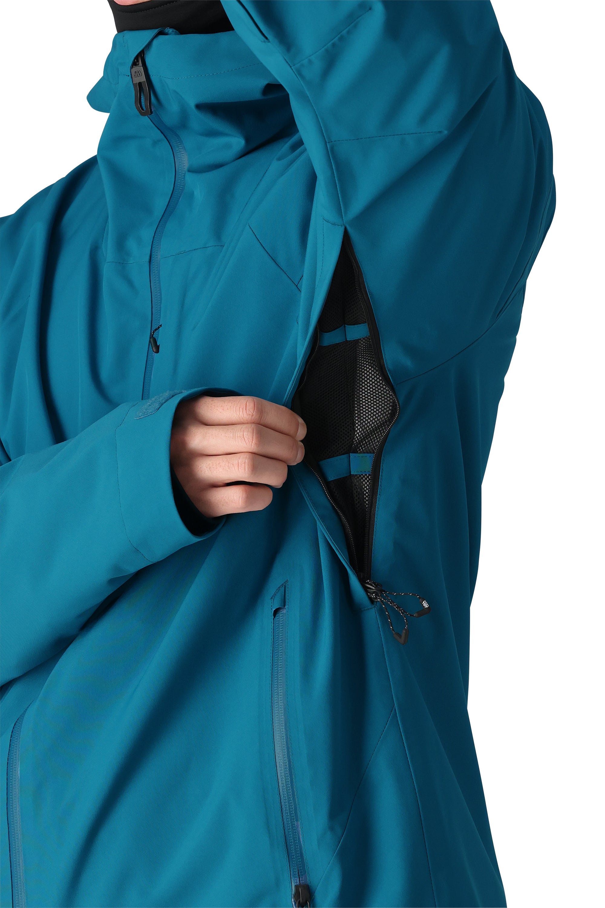 The 686 Gateway Shell Jacket 2025 is primarily blue with an insulated hood and multiple zippered pockets.