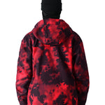 The 686 Gateway Shell Jacket 2025 has a striking red and black tie-dye pattern on its front view.